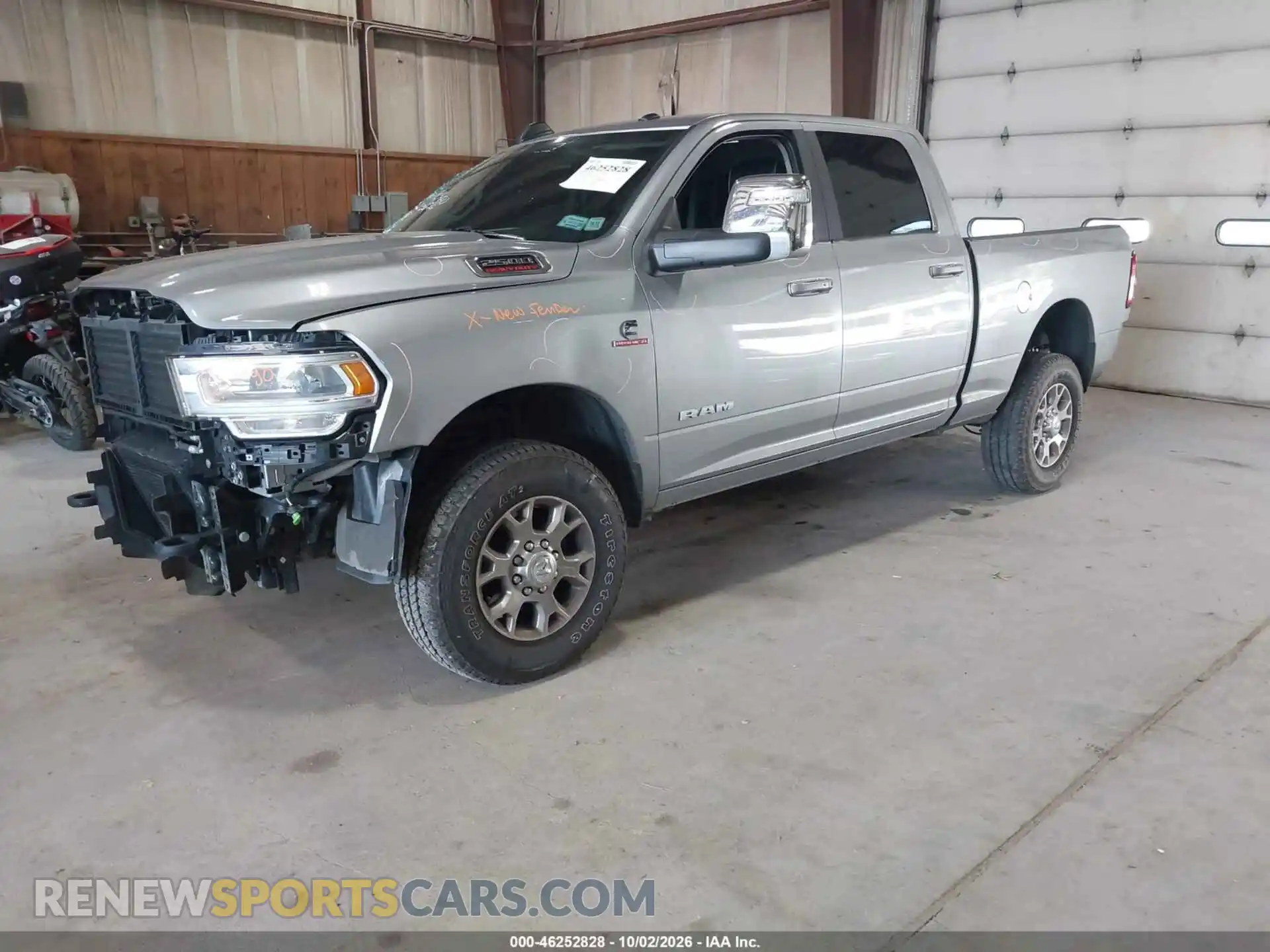 2 Photograph of a damaged car 3C6UR5FL3RG366931 RAM 2500 2024