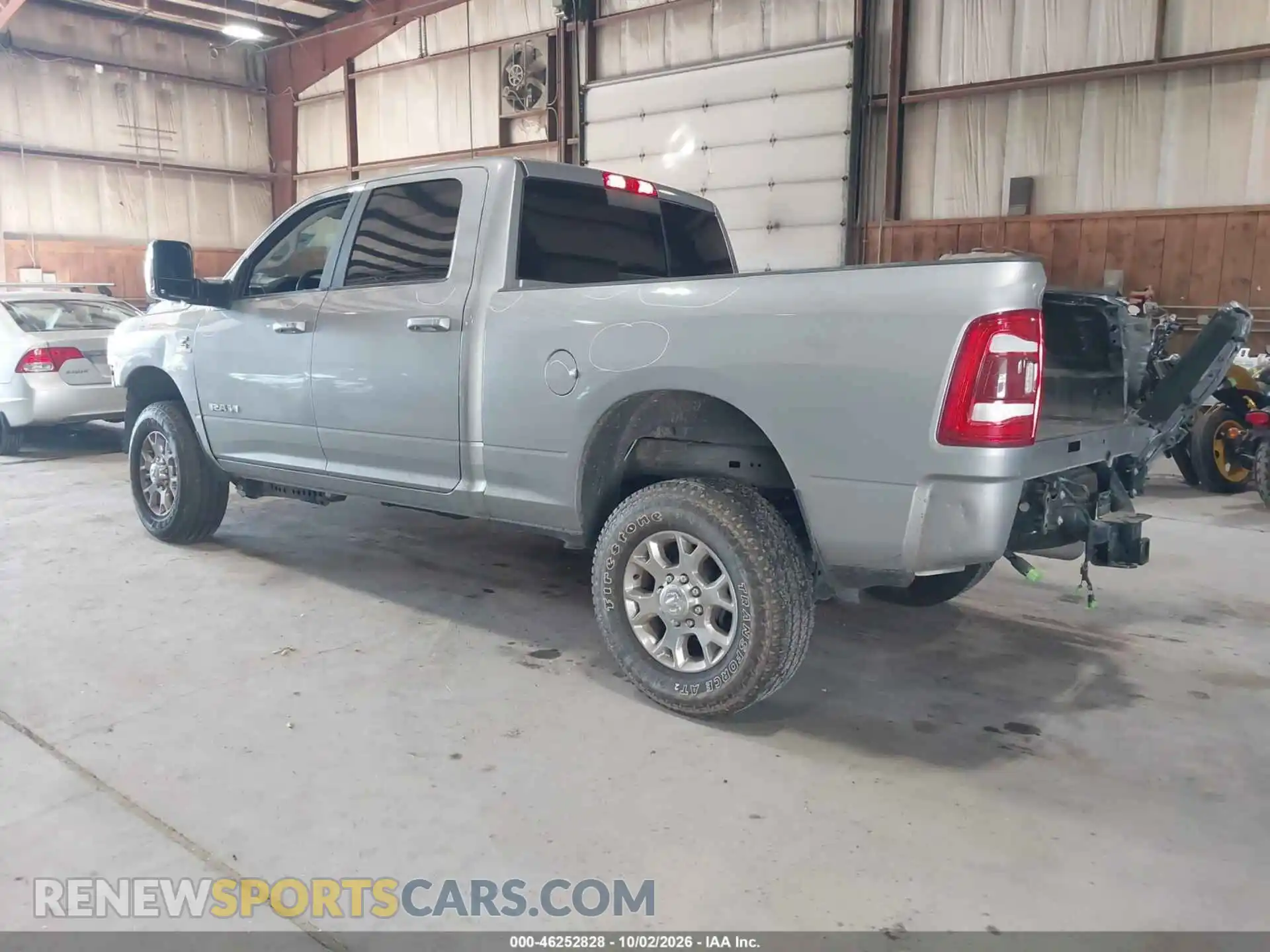 3 Photograph of a damaged car 3C6UR5FL3RG366931 RAM 2500 2024