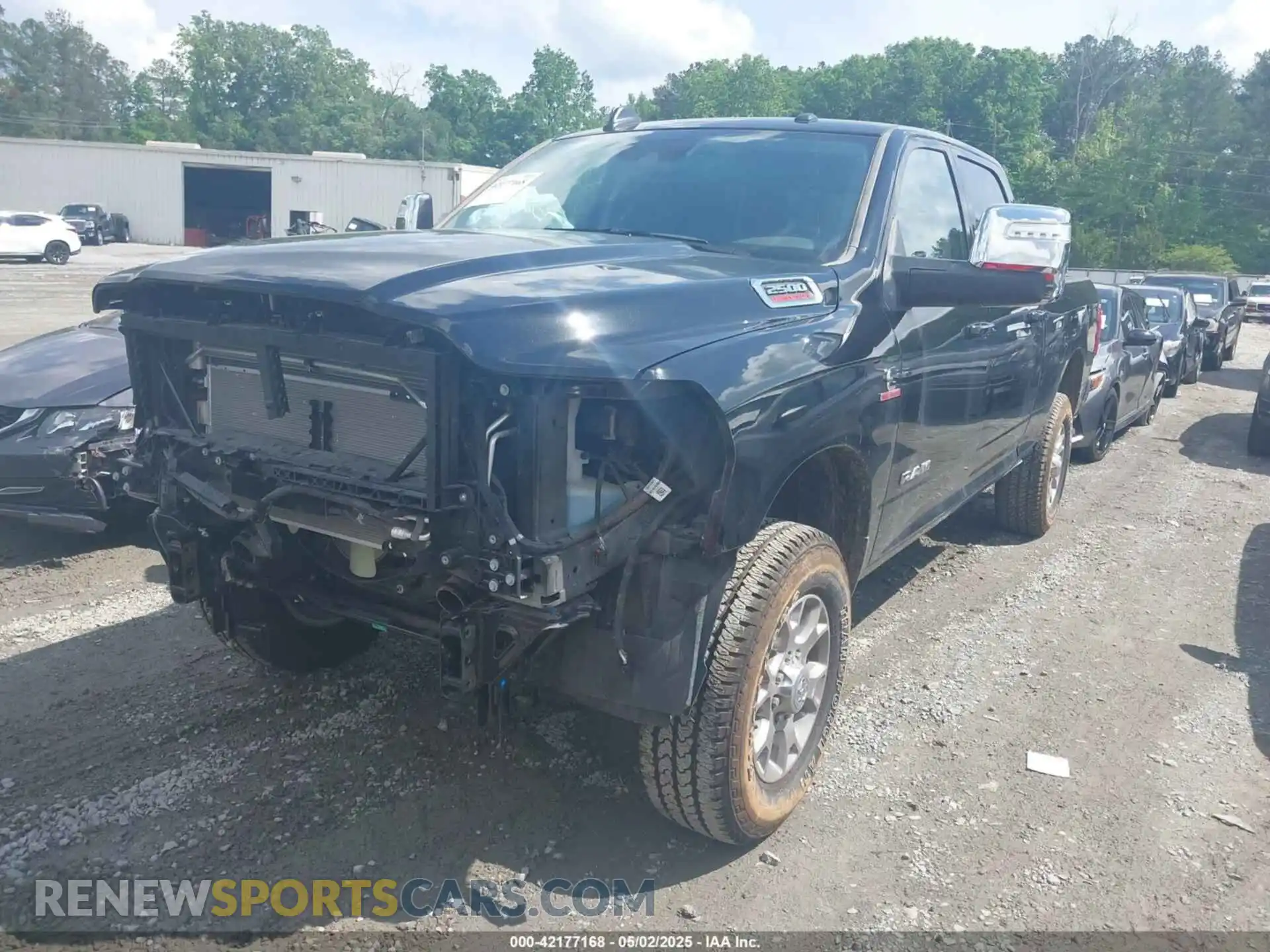 2 Photograph of a damaged car 3C6UR5FL3RG407946 RAM 2500 2024