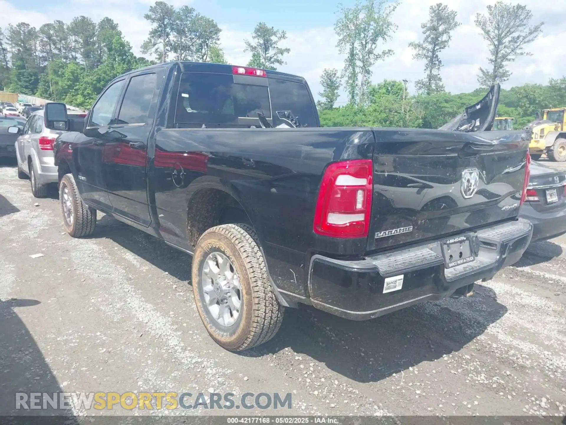 3 Photograph of a damaged car 3C6UR5FL3RG407946 RAM 2500 2024