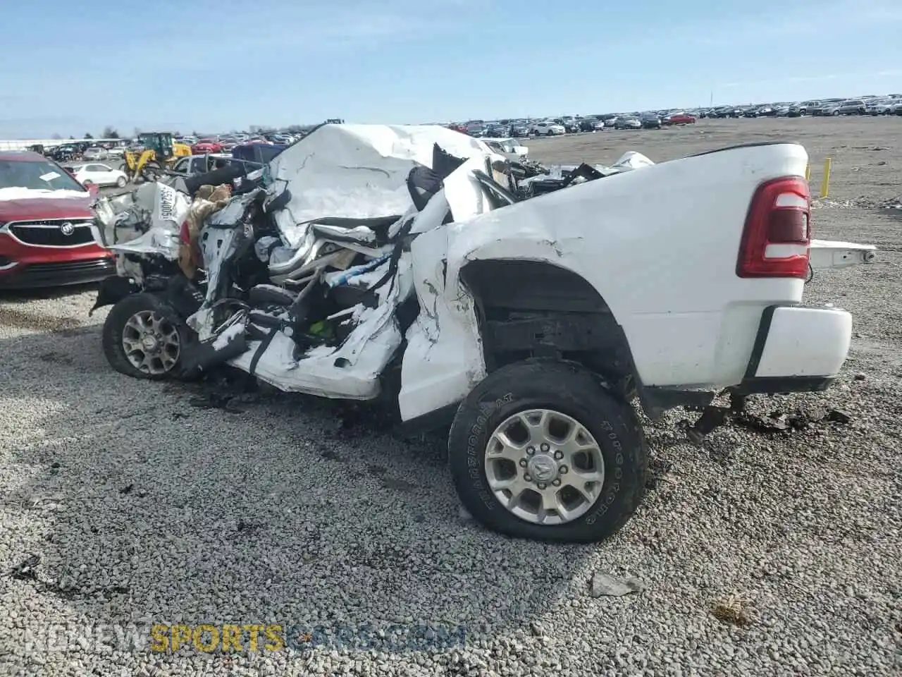 2 Photograph of a damaged car 3C6UR5FL4RG196210 RAM 2500 2024