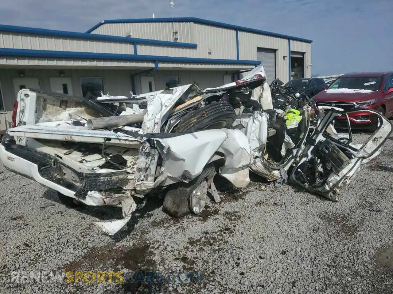 3 Photograph of a damaged car 3C6UR5FL4RG196210 RAM 2500 2024