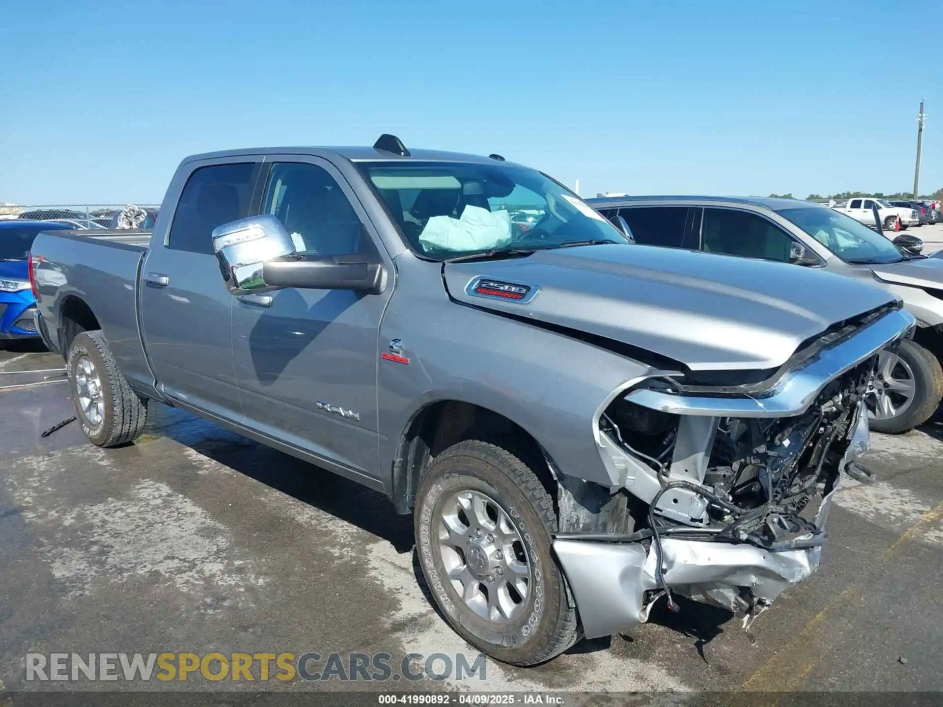 1 Photograph of a damaged car 3C6UR5FL4RG367117 RAM 2500 2024