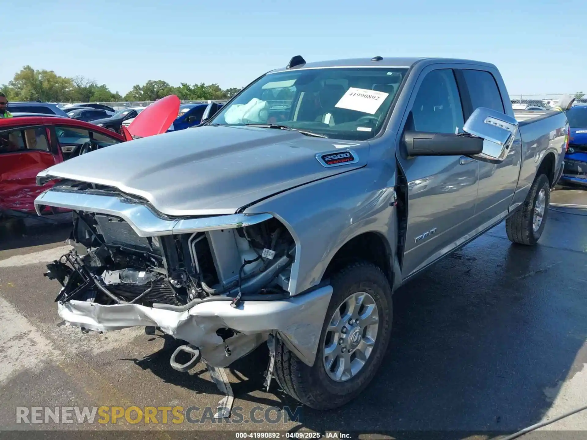 2 Photograph of a damaged car 3C6UR5FL4RG367117 RAM 2500 2024