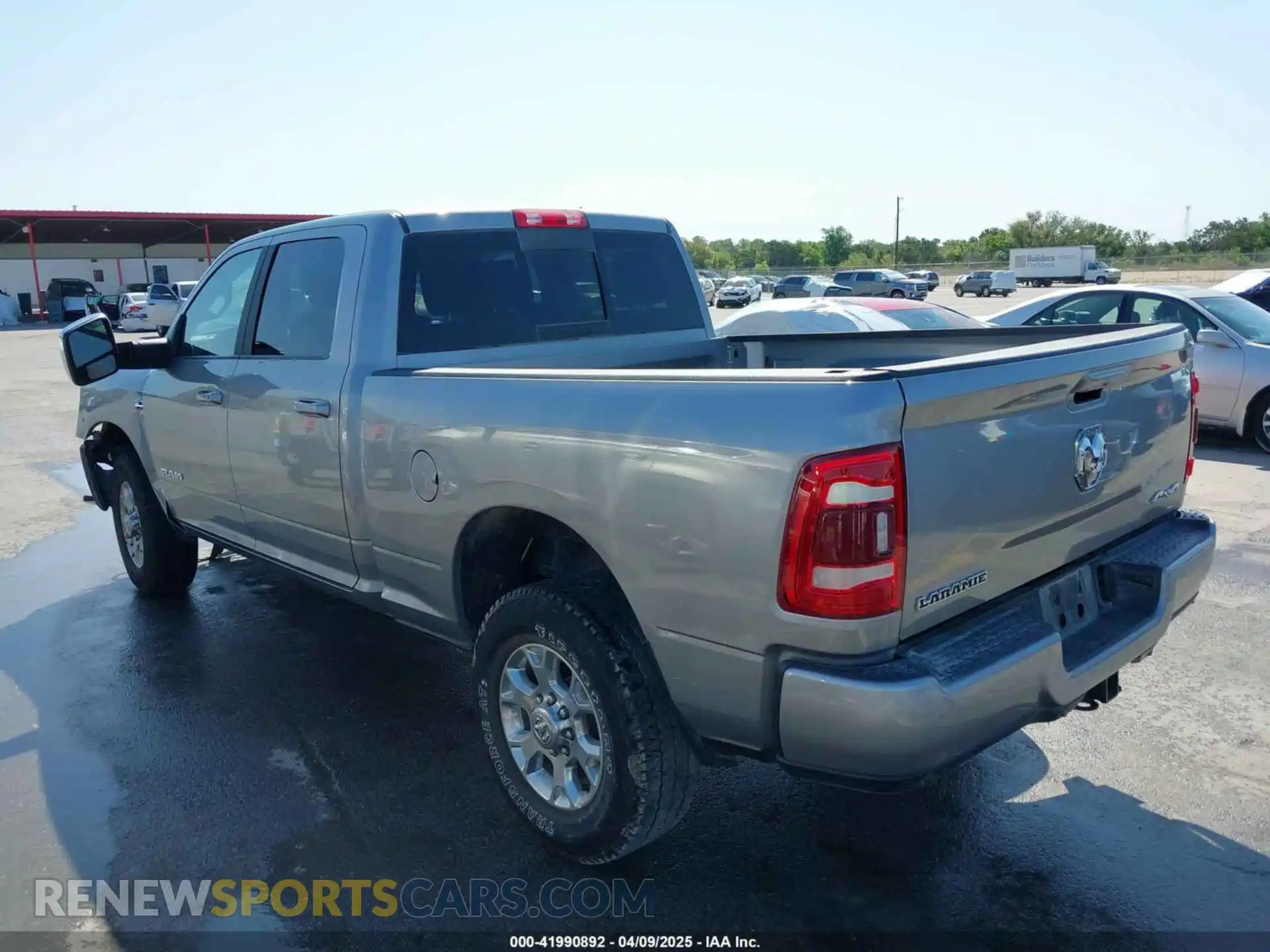 3 Photograph of a damaged car 3C6UR5FL4RG367117 RAM 2500 2024