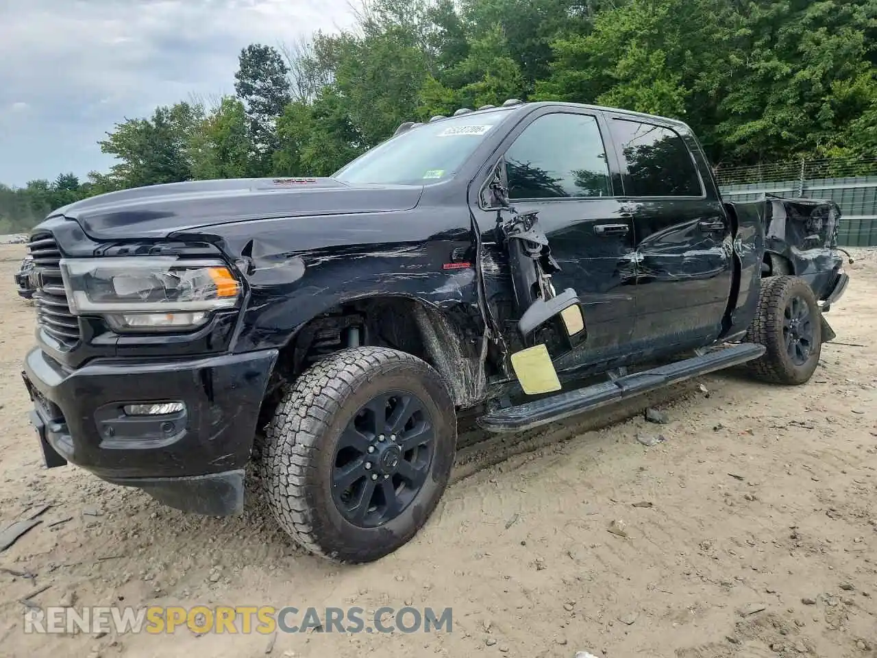 1 Photograph of a damaged car 3C6UR5FL5RG103291 RAM 2500 2024