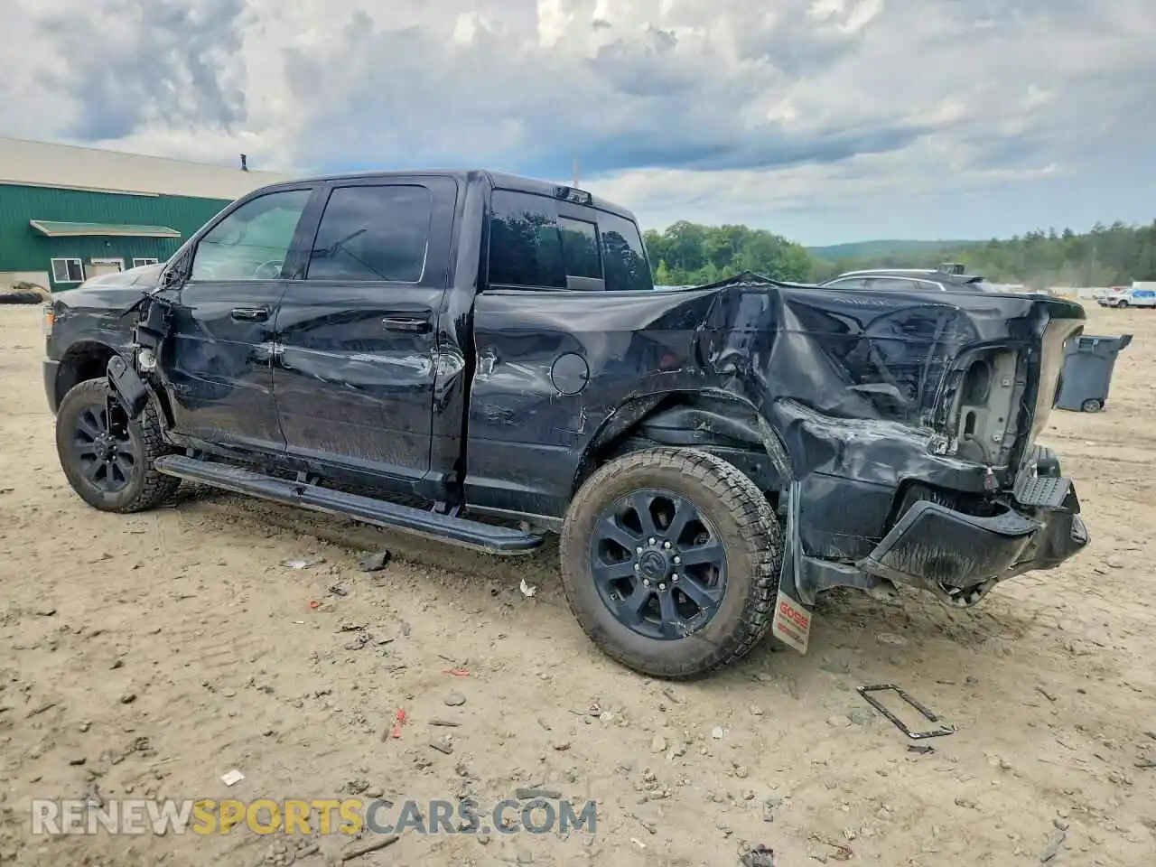 2 Photograph of a damaged car 3C6UR5FL5RG103291 RAM 2500 2024