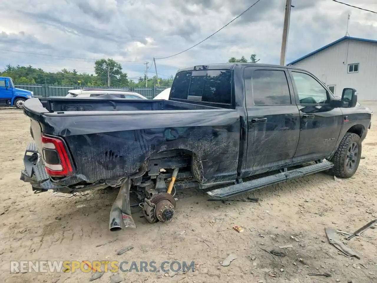 3 Photograph of a damaged car 3C6UR5FL5RG103291 RAM 2500 2024