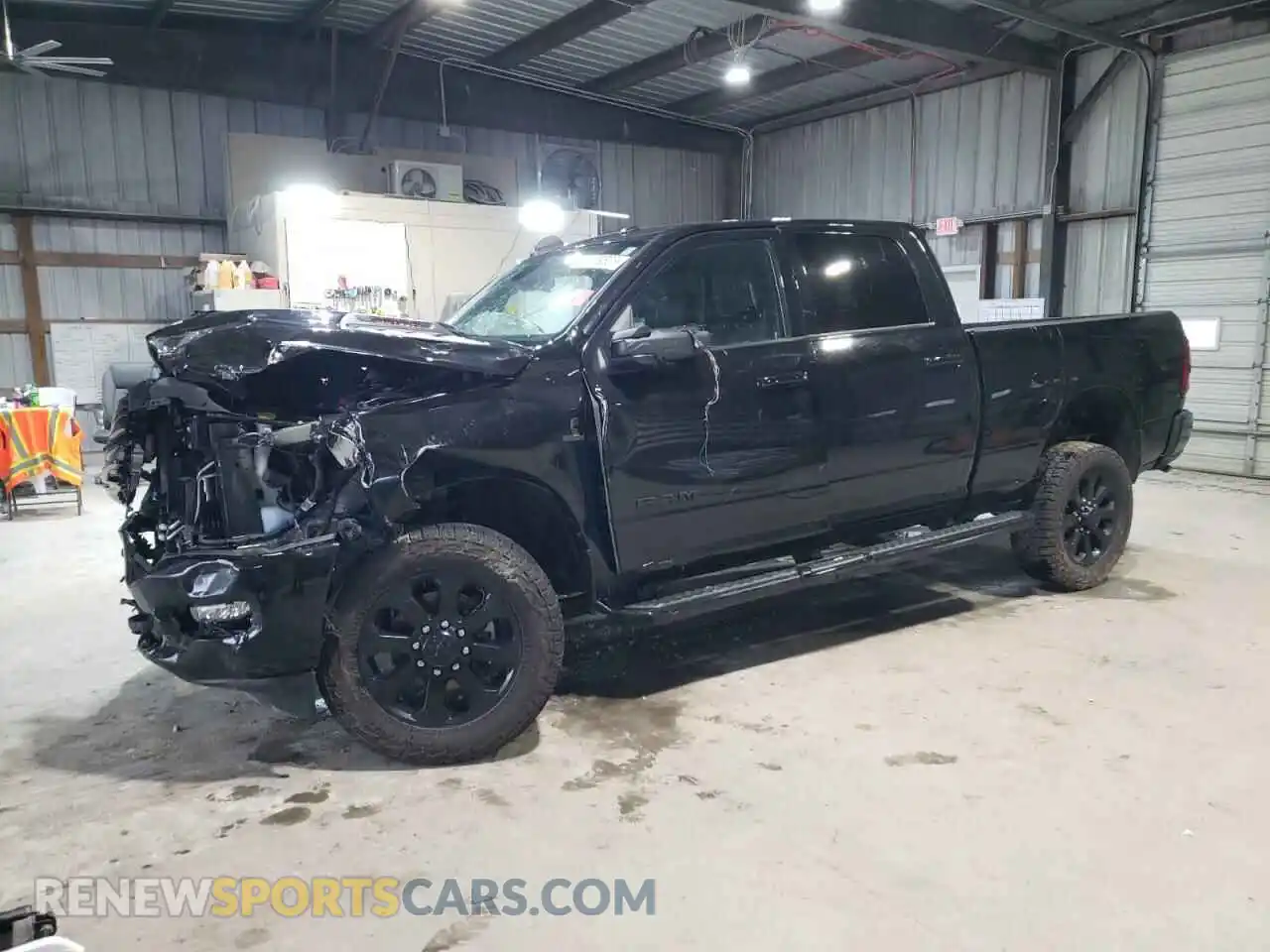 1 Photograph of a damaged car 3C6UR5FL5RG131477 RAM 2500 2024