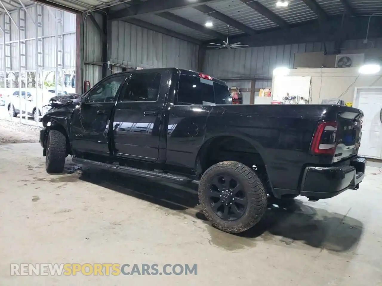 2 Photograph of a damaged car 3C6UR5FL5RG131477 RAM 2500 2024