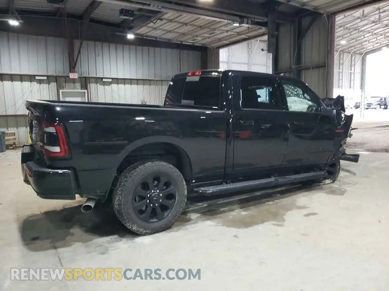 3 Photograph of a damaged car 3C6UR5FL5RG131477 RAM 2500 2024