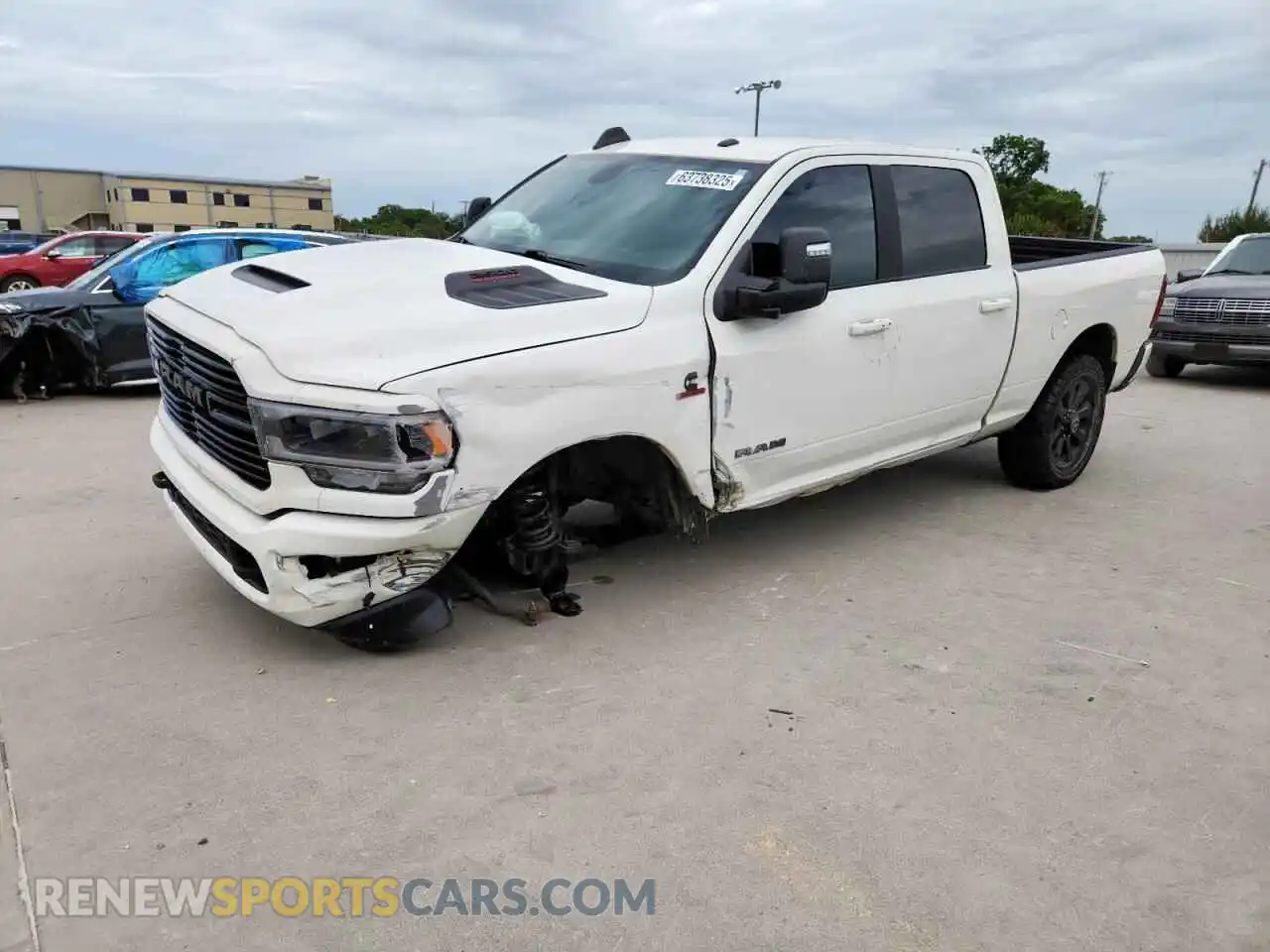 1 Photograph of a damaged car 3C6UR5FL5RG163118 RAM 2500 2024