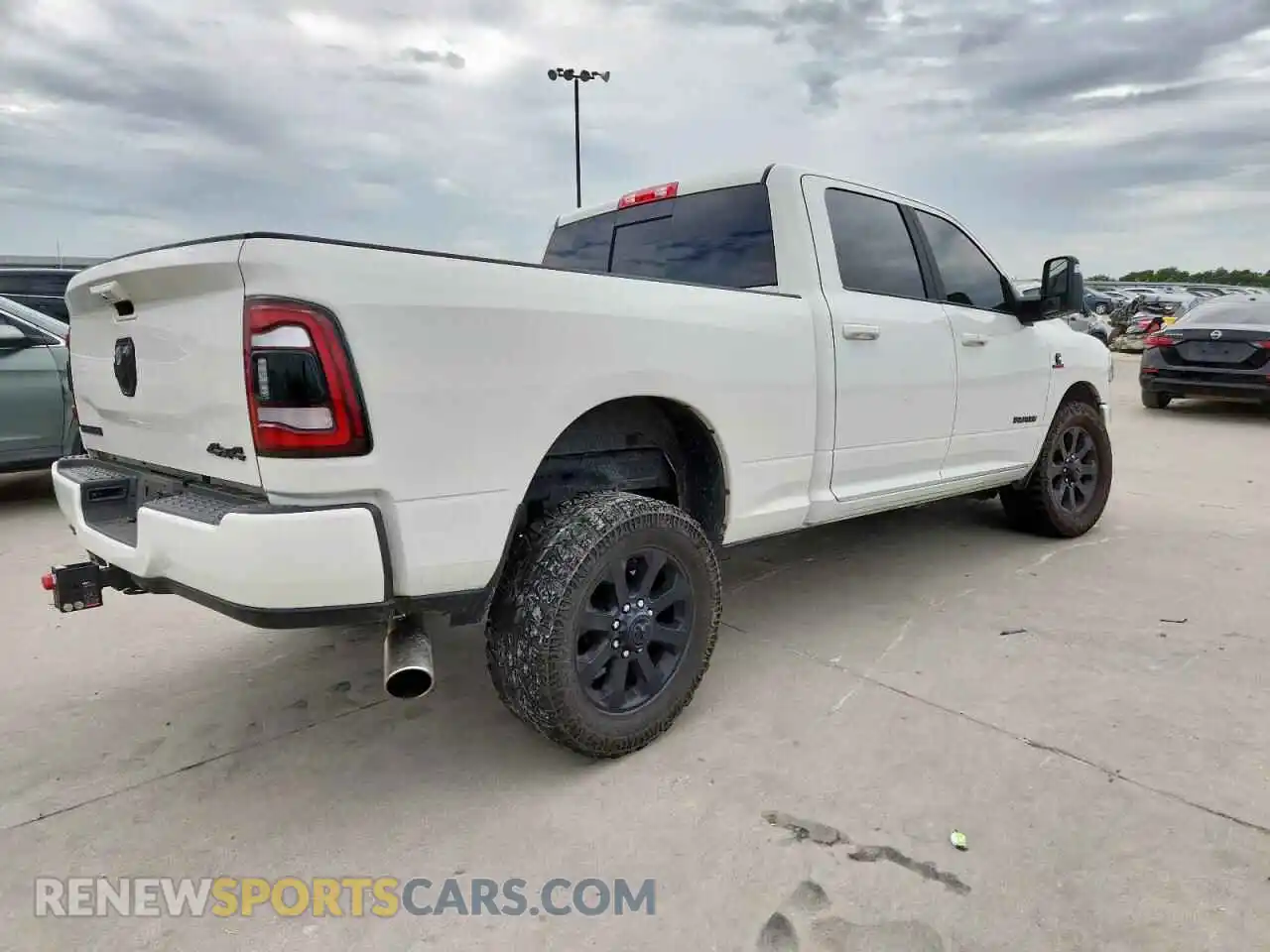 3 Photograph of a damaged car 3C6UR5FL5RG163118 RAM 2500 2024