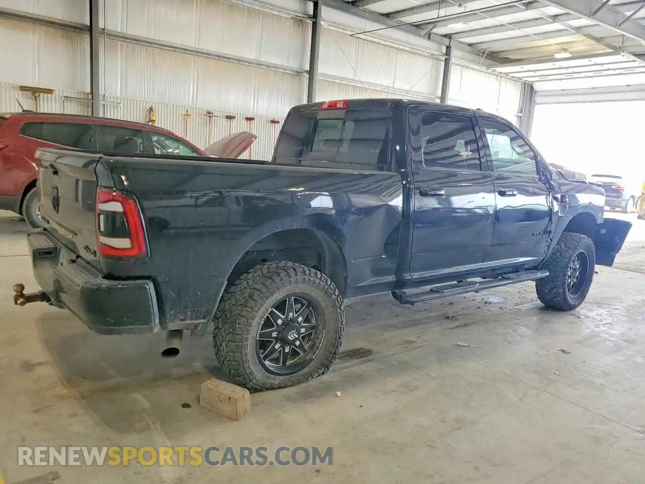 3 Photograph of a damaged car 3C6UR5FL6RG141709 RAM 2500 2024