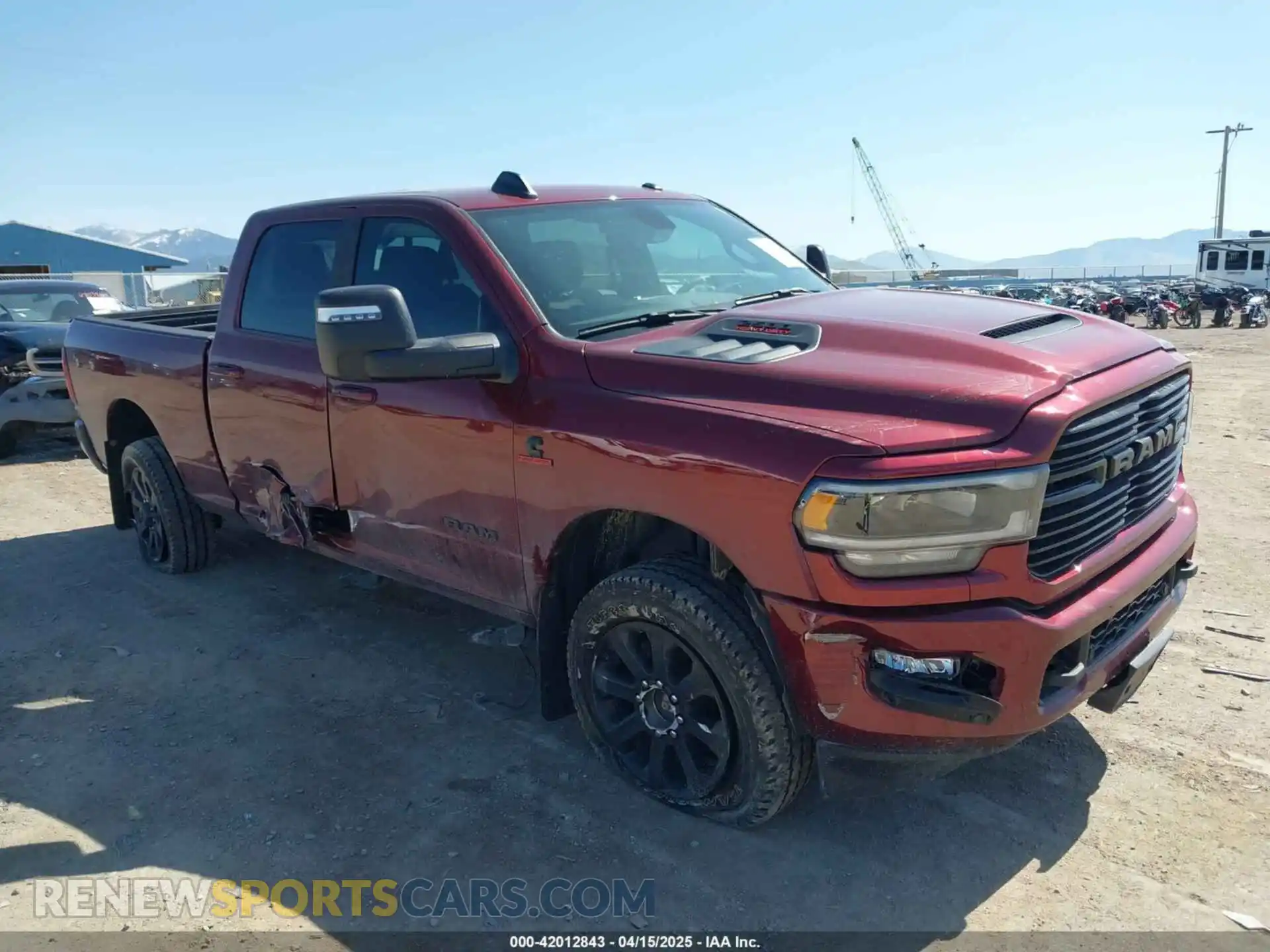 1 Photograph of a damaged car 3C6UR5FL6RG143993 RAM 2500 2024