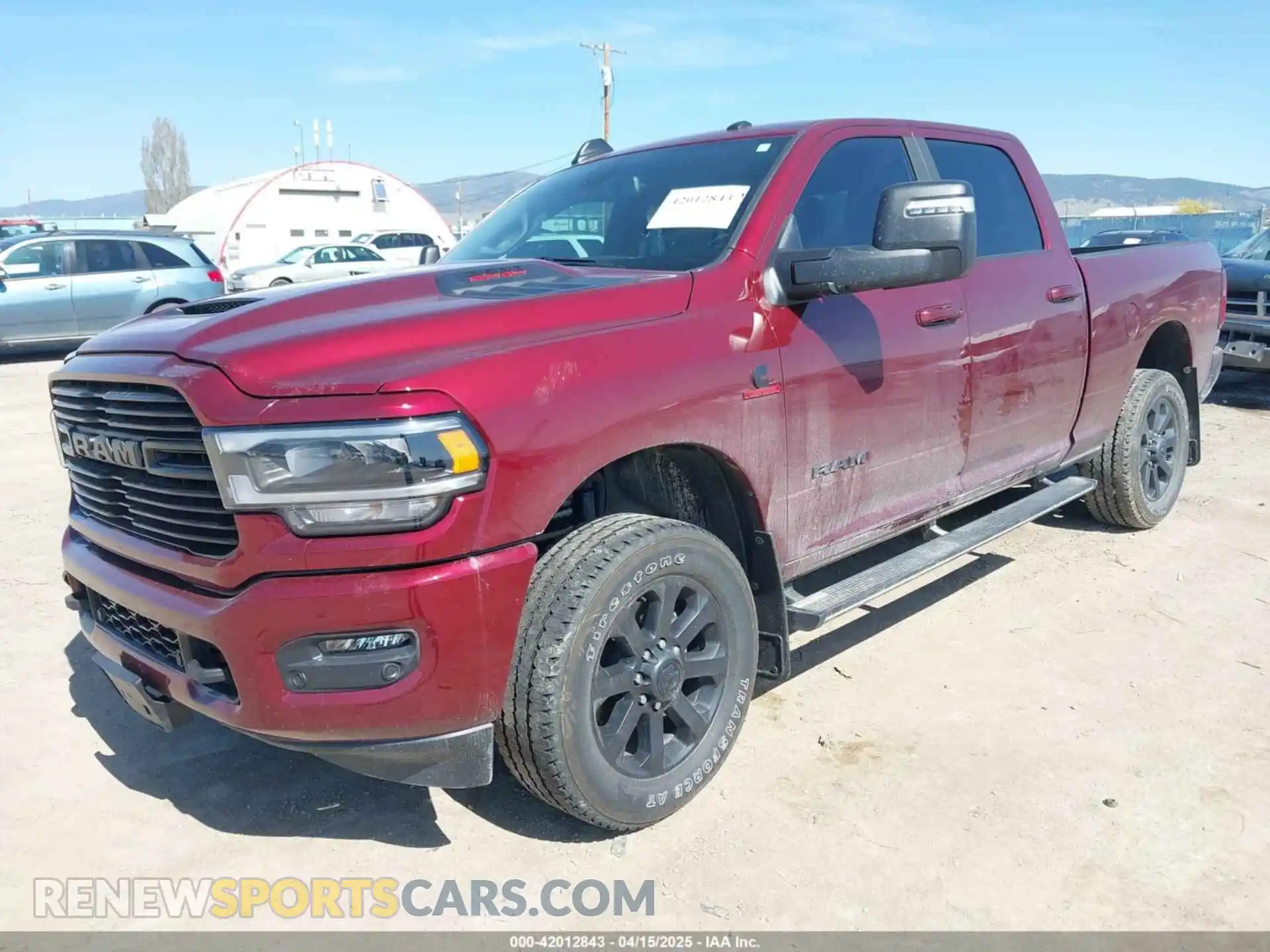 2 Photograph of a damaged car 3C6UR5FL6RG143993 RAM 2500 2024