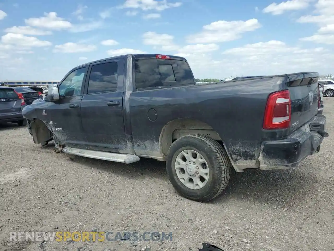 2 Photograph of a damaged car 3C6UR5FL6RG159952 RAM 2500 2024