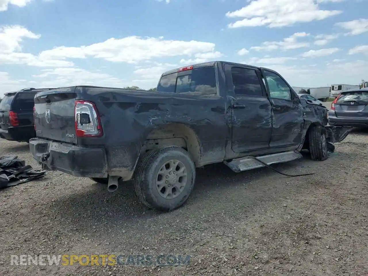 3 Photograph of a damaged car 3C6UR5FL6RG159952 RAM 2500 2024