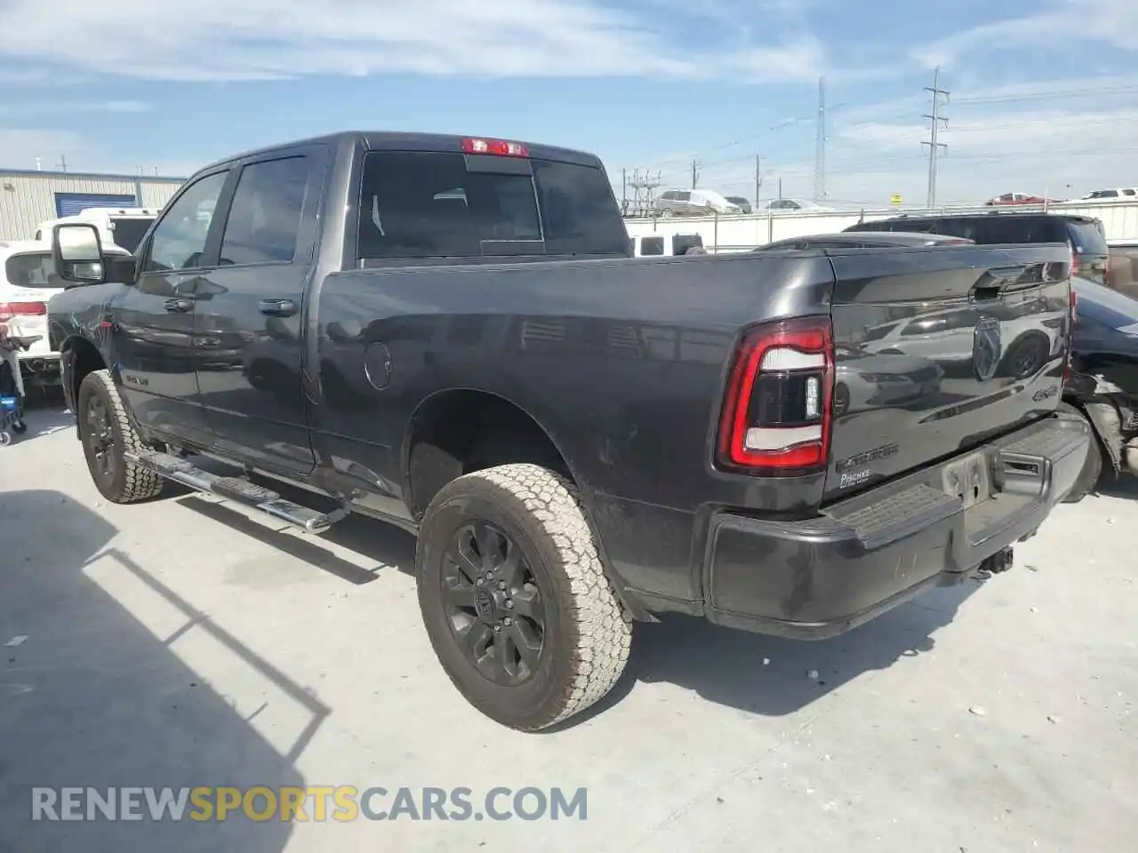 2 Photograph of a damaged car 3C6UR5FL9RG104279 RAM 2500 2024