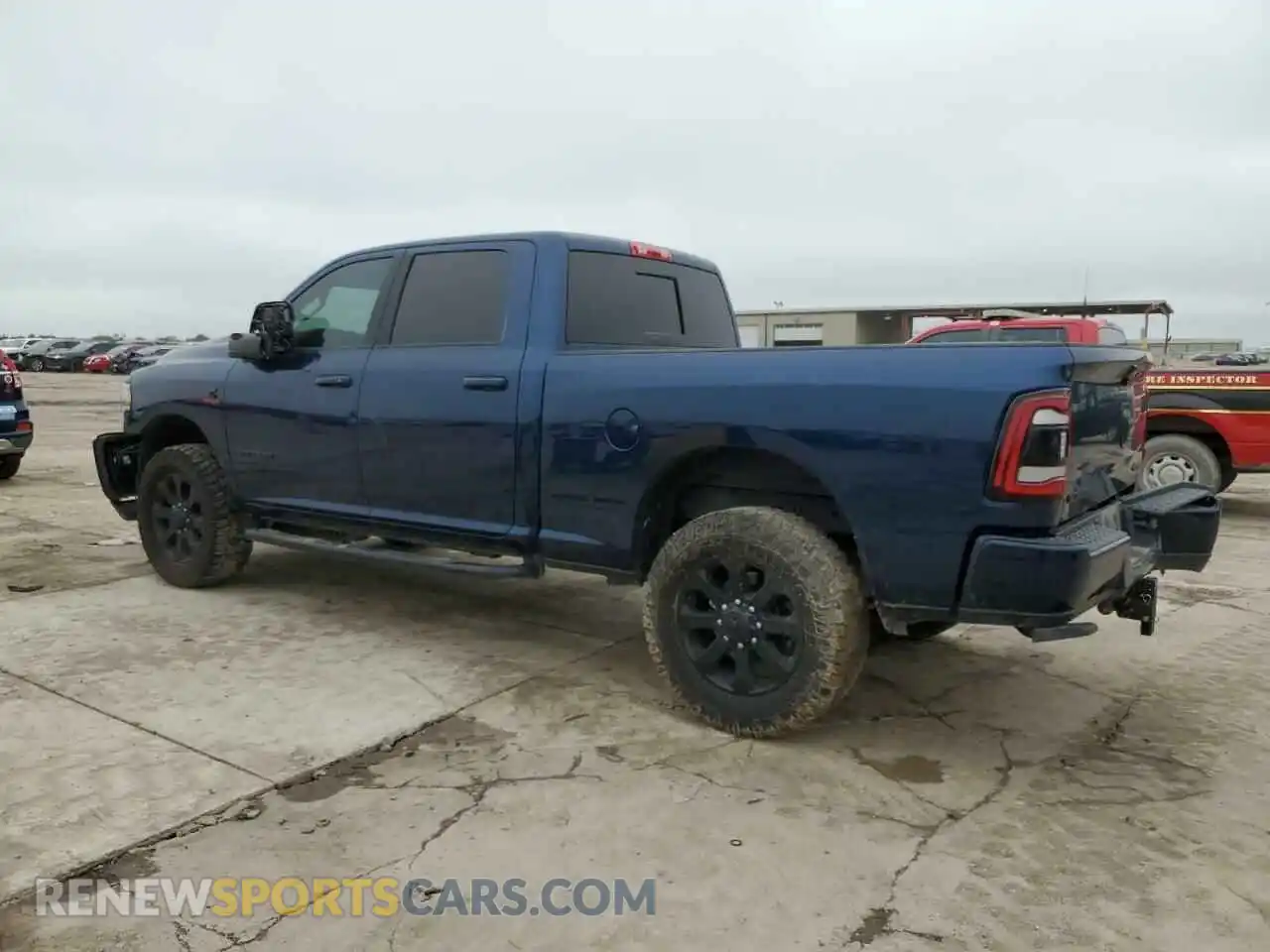 2 Photograph of a damaged car 3C6UR5FL9RG278143 RAM 2500 2024