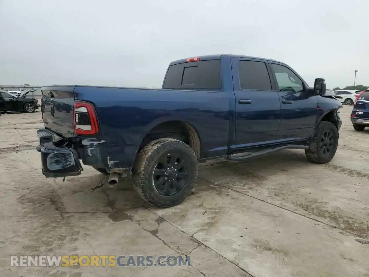 3 Photograph of a damaged car 3C6UR5FL9RG278143 RAM 2500 2024