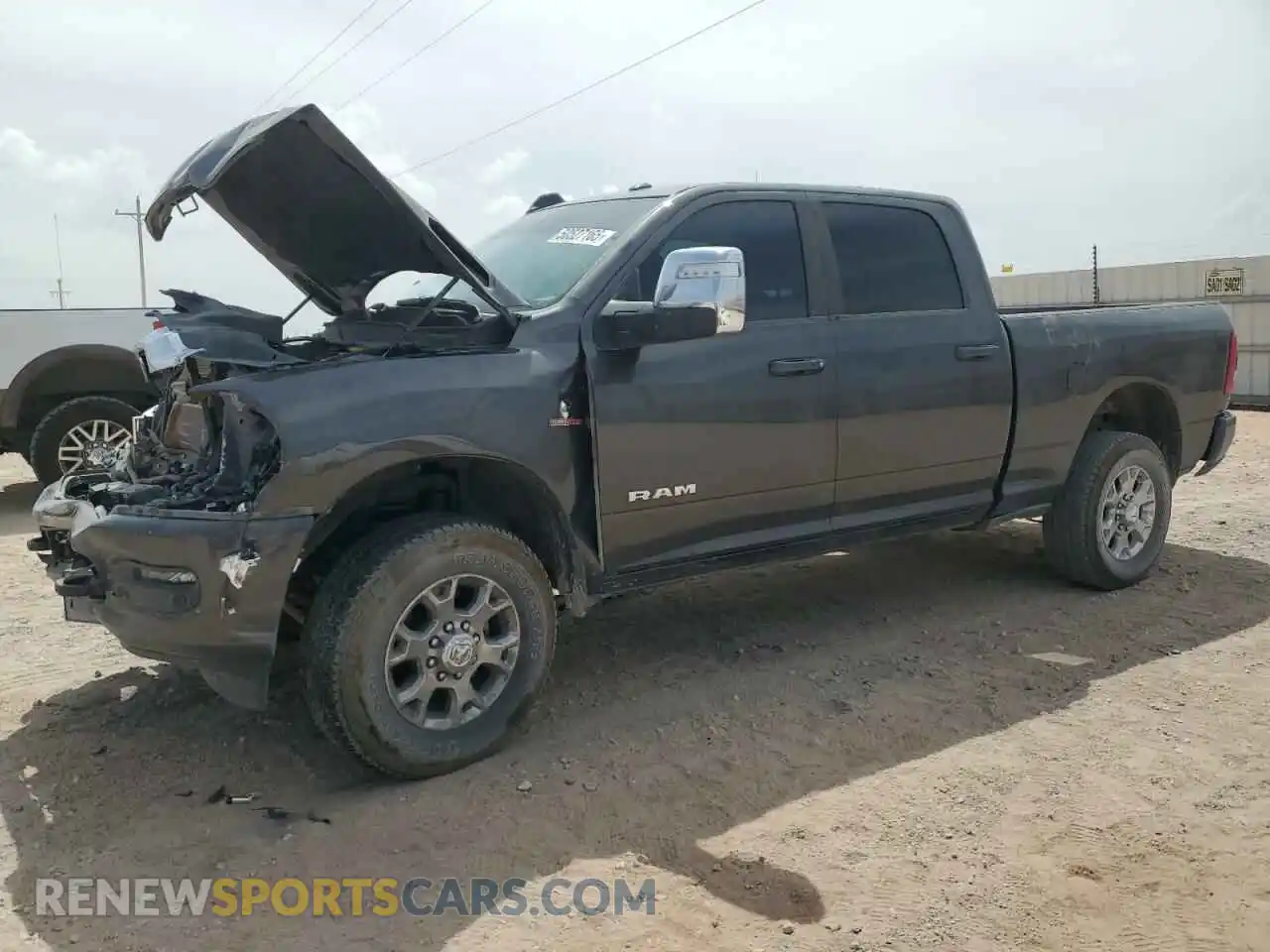 1 Photograph of a damaged car 3C6UR5FL9RG355268 RAM 2500 2024