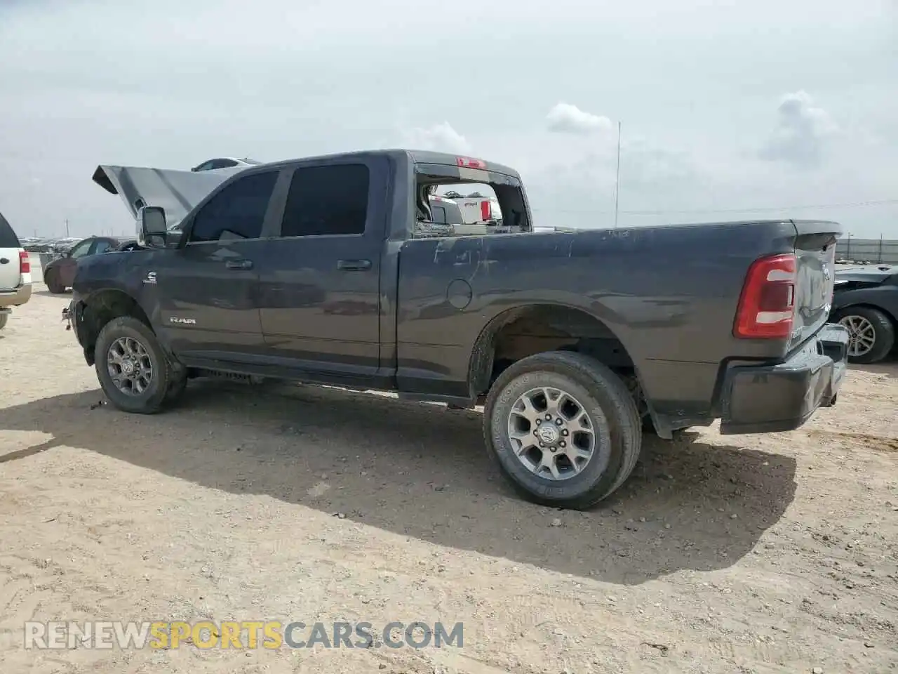 2 Photograph of a damaged car 3C6UR5FL9RG355268 RAM 2500 2024