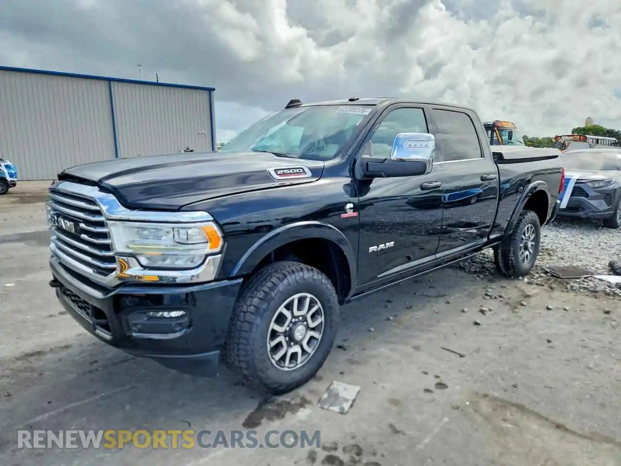 1 Photograph of a damaged car 3C6UR5GL1RG239142 RAM 2500 2024