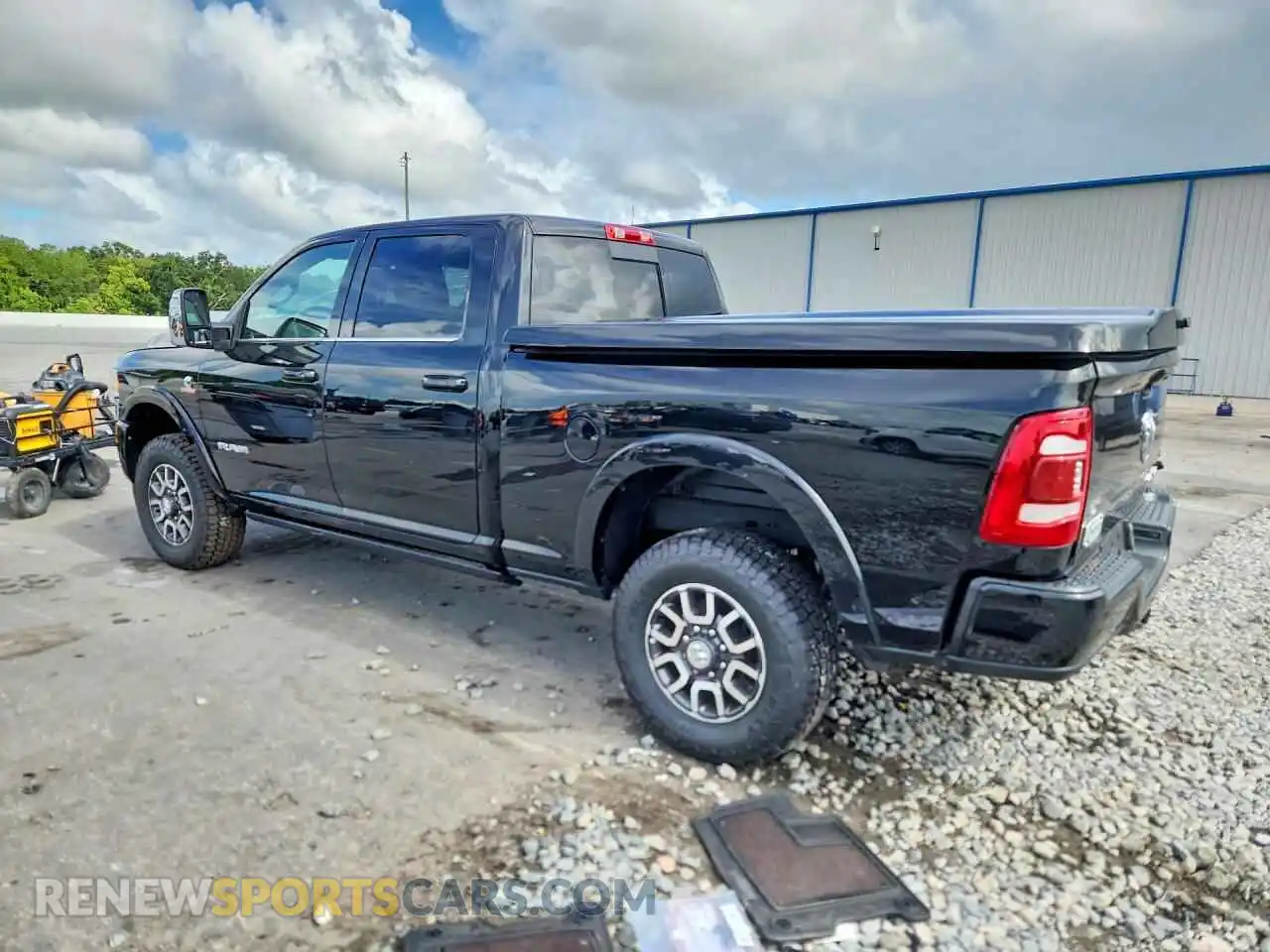 3 Photograph of a damaged car 3C6UR5GL1RG239142 RAM 2500 2024