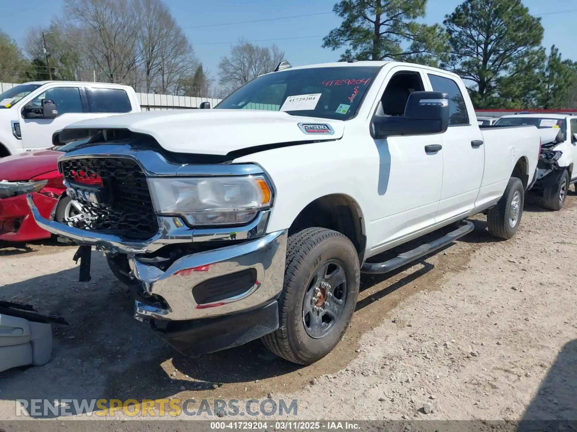 2 Photograph of a damaged car 3C6UR5HJ1RG327380 RAM 2500 2024