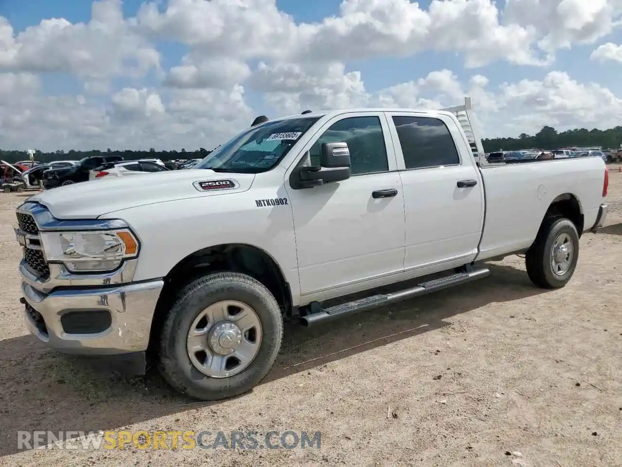 1 Photograph of a damaged car 3C6UR5HJ2RG130864 RAM 2500 2024