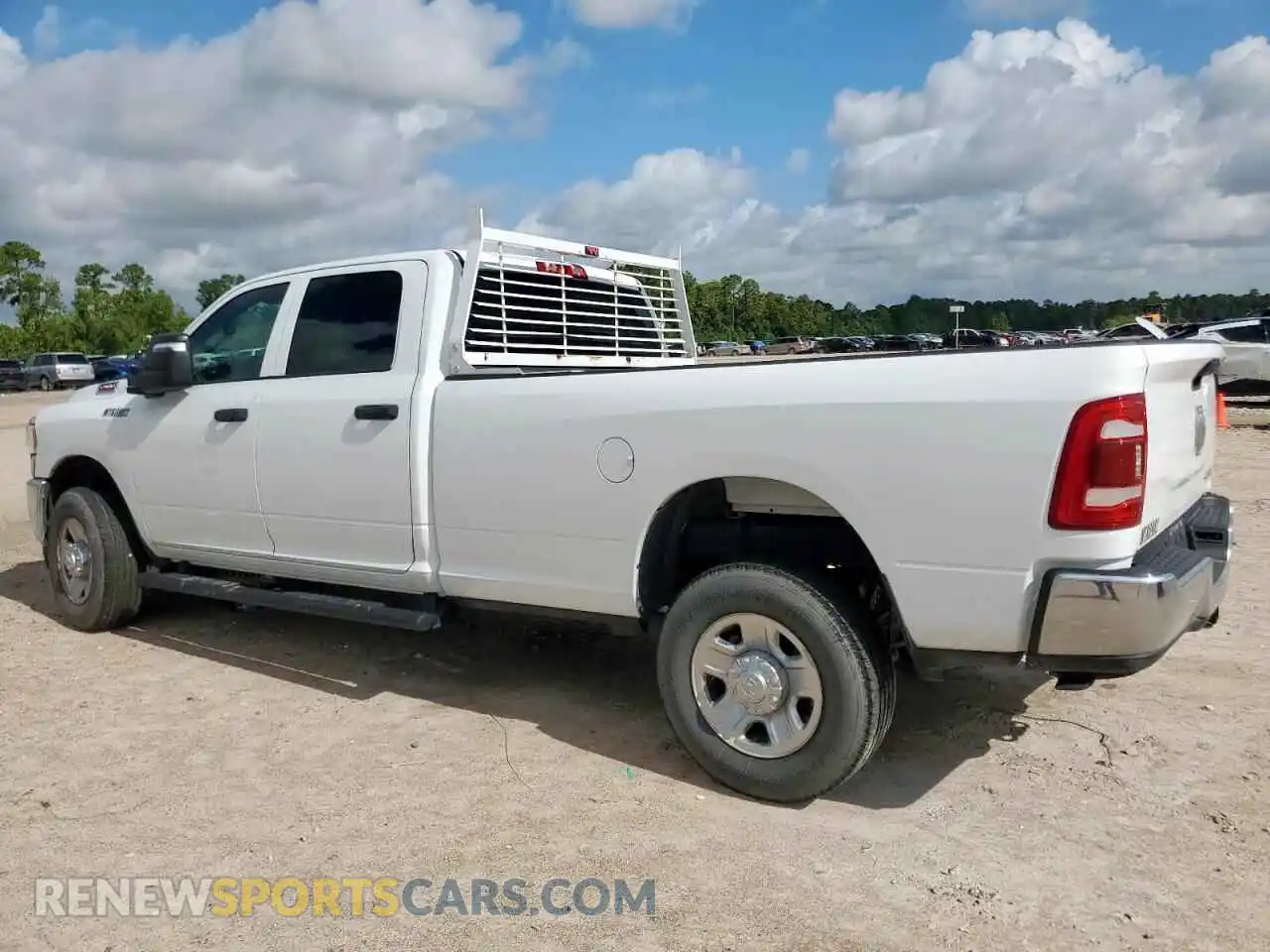 2 Photograph of a damaged car 3C6UR5HJ2RG130864 RAM 2500 2024