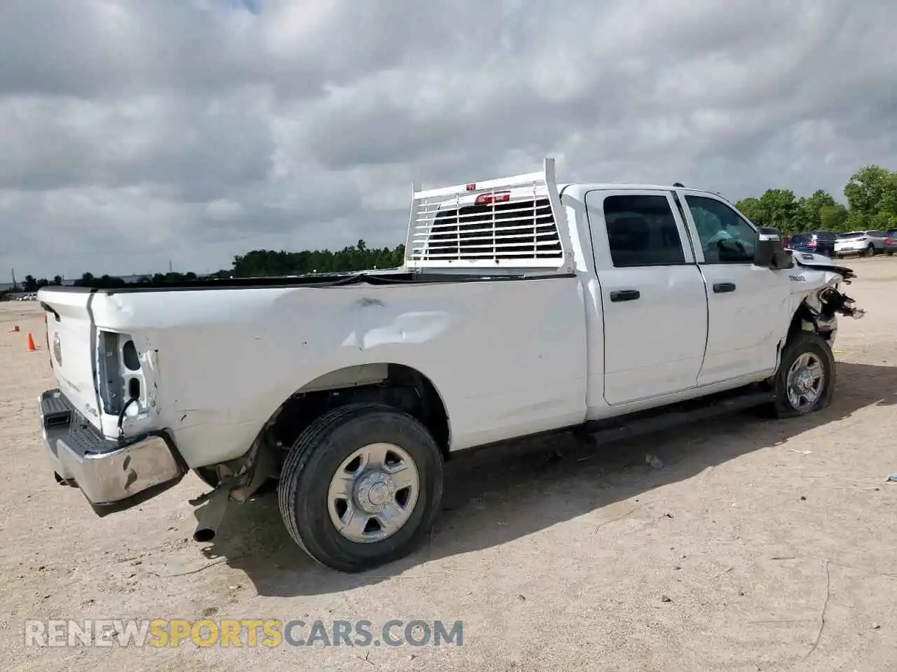 3 Photograph of a damaged car 3C6UR5HJ2RG130864 RAM 2500 2024