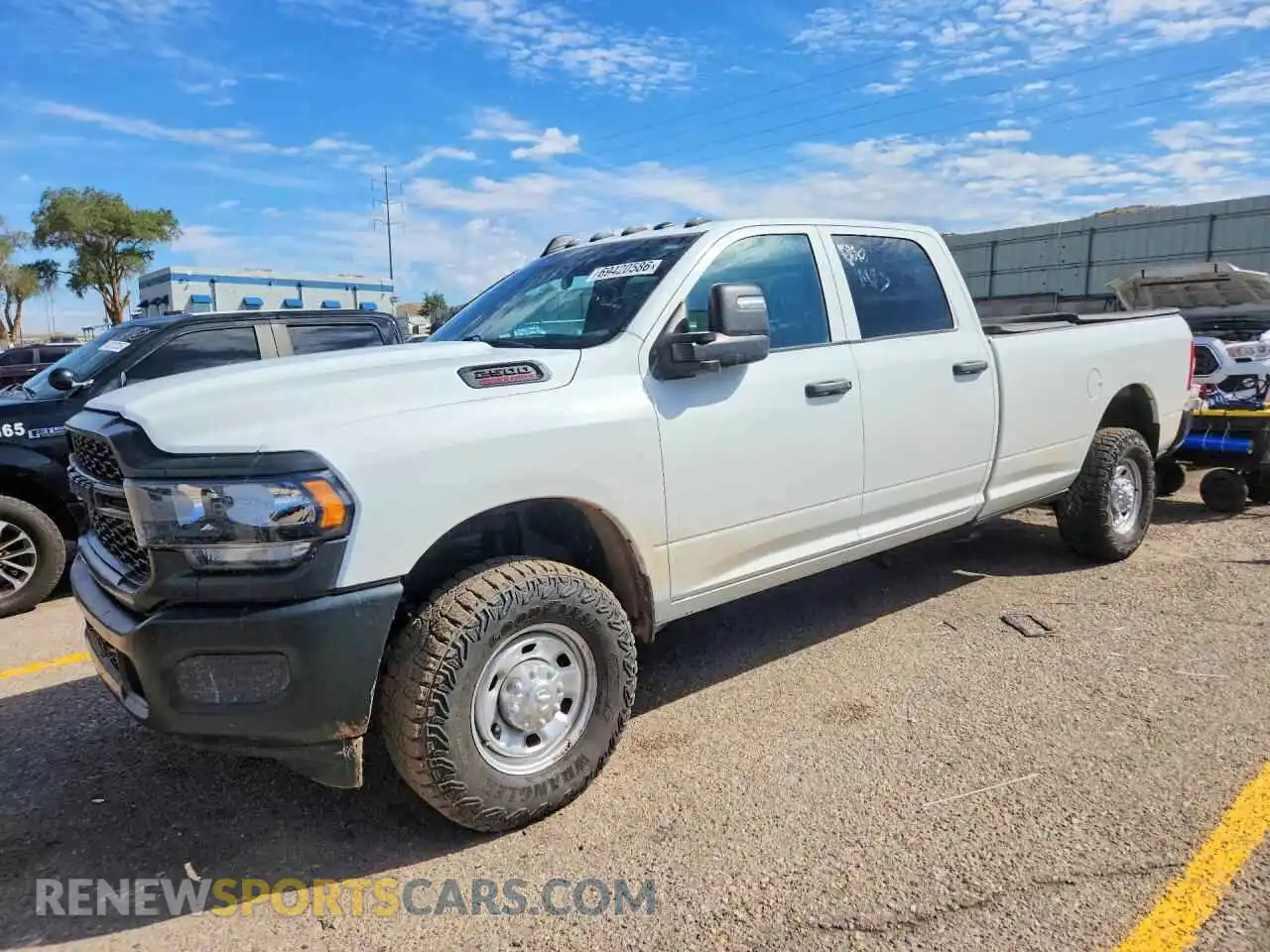1 Photograph of a damaged car 3C6UR5HJ2RG317859 RAM 2500 2024