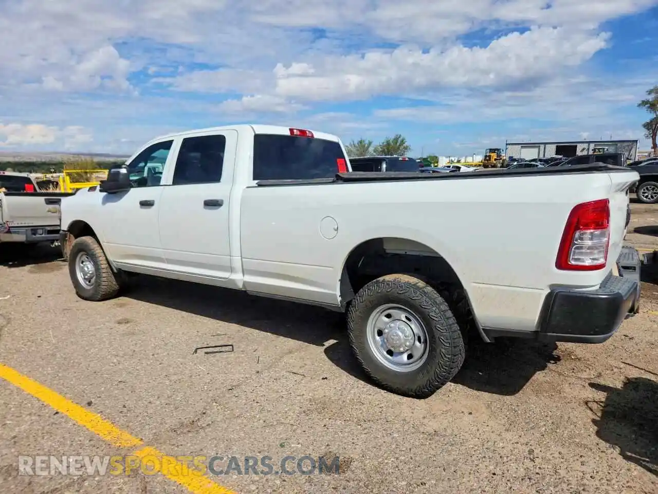 2 Photograph of a damaged car 3C6UR5HJ2RG317859 RAM 2500 2024