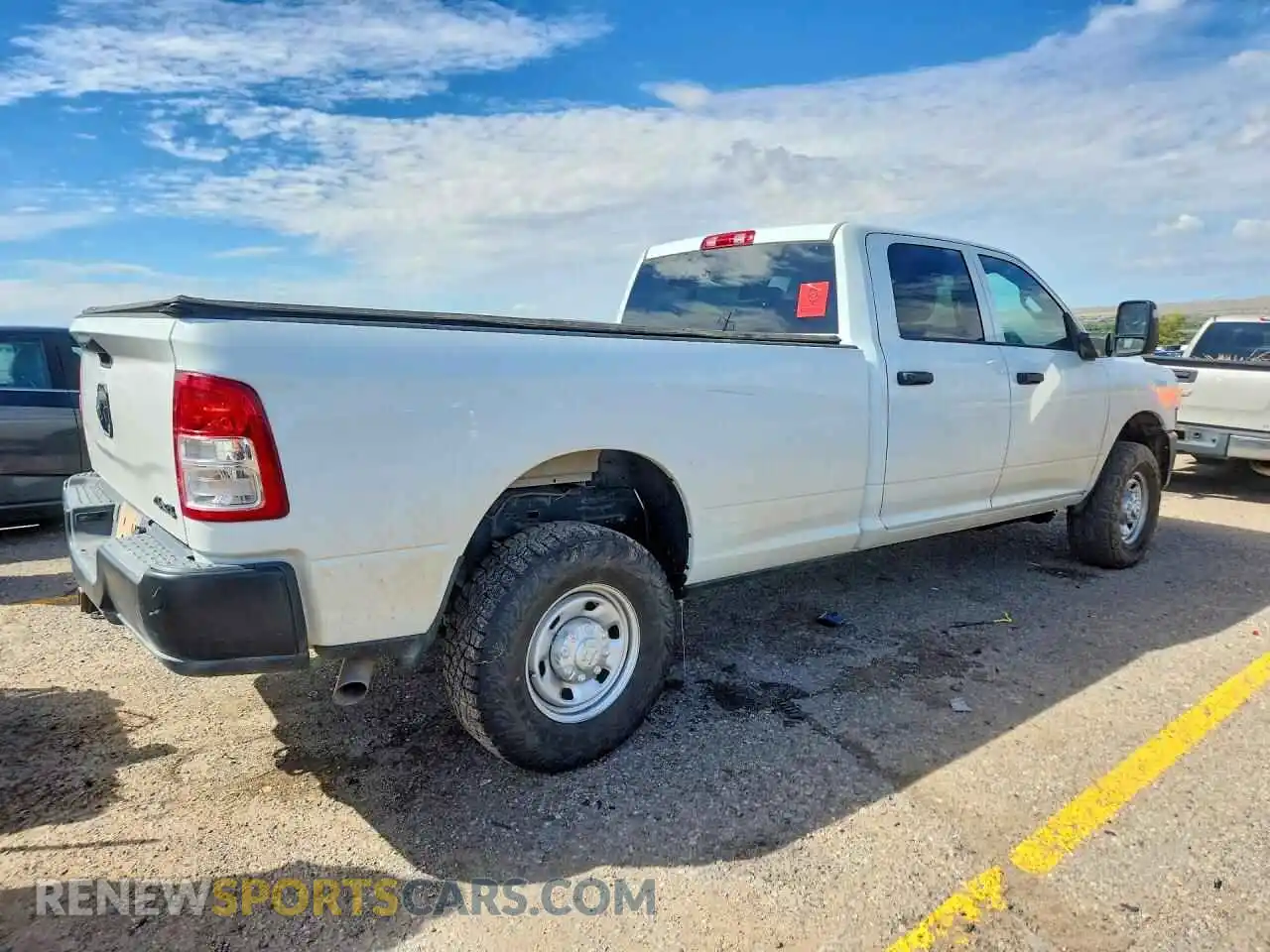 3 Photograph of a damaged car 3C6UR5HJ2RG317859 RAM 2500 2024
