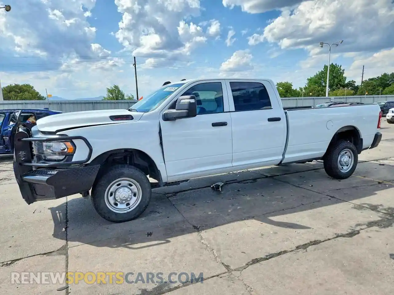 1 Photograph of a damaged car 3C6UR5HJ6RG173796 RAM 2500 2024