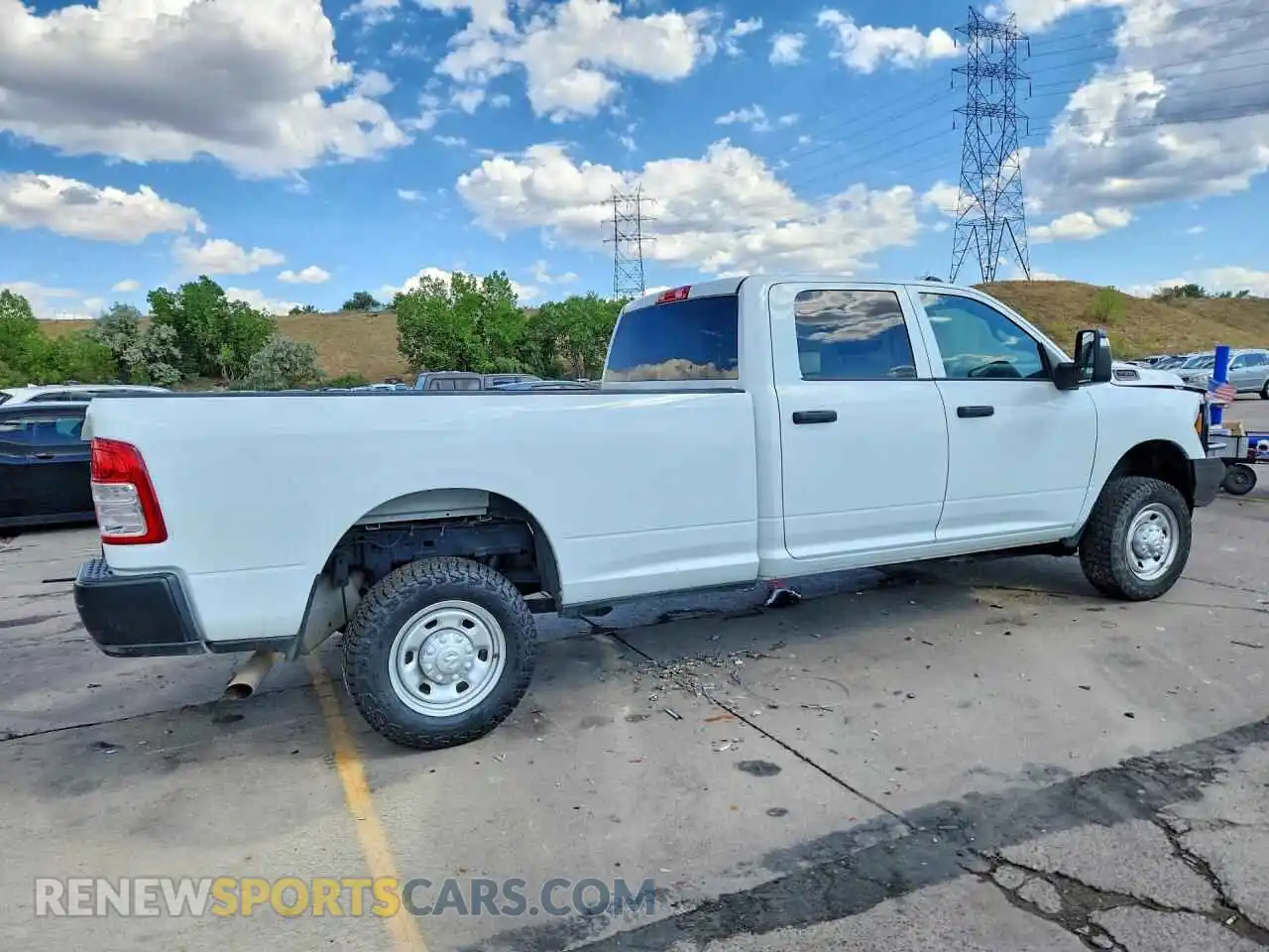 3 Photograph of a damaged car 3C6UR5HJ6RG173796 RAM 2500 2024