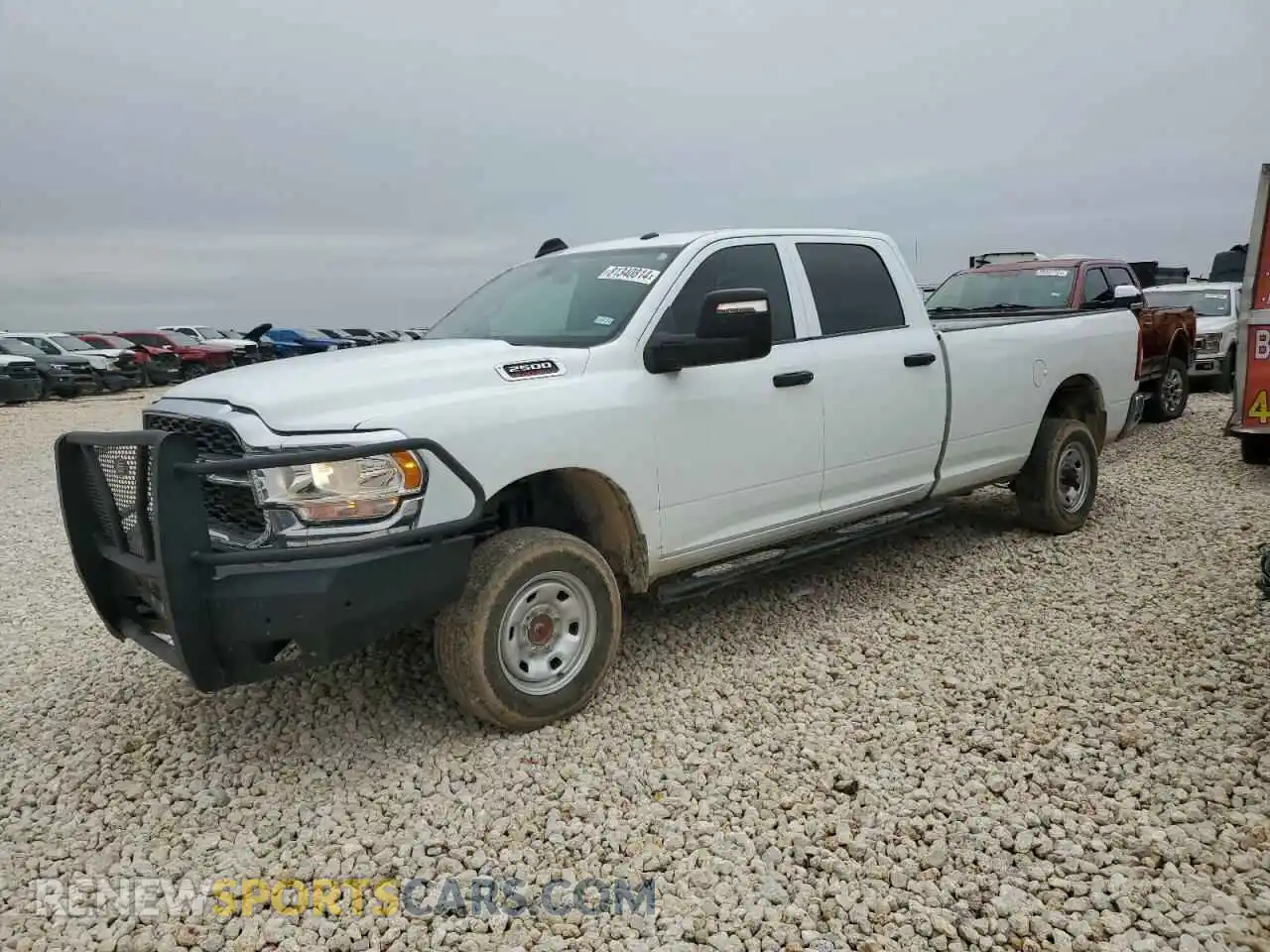 1 Photograph of a damaged car 3C6UR5HJ7RG139575 RAM 2500 2024
