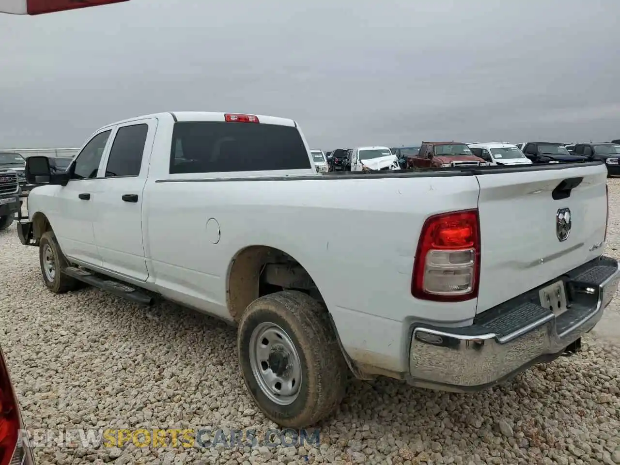 2 Photograph of a damaged car 3C6UR5HJ7RG139575 RAM 2500 2024