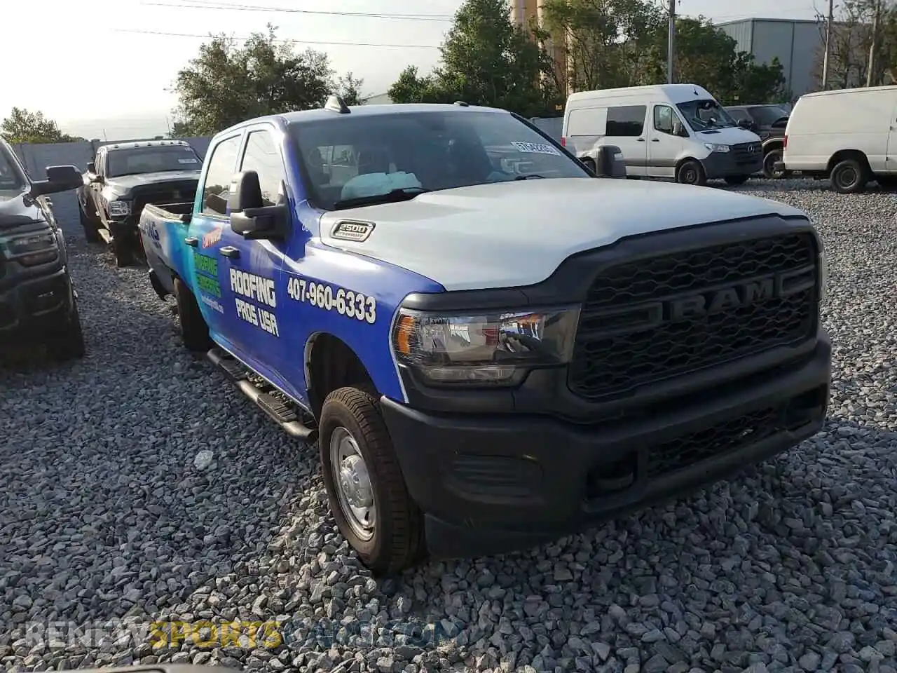 1 Photograph of a damaged car 3C6UR5HJ7RG142671 RAM 2500 2024