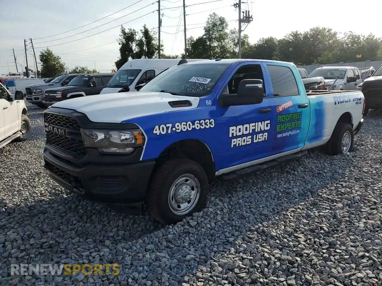 2 Photograph of a damaged car 3C6UR5HJ7RG142671 RAM 2500 2024
