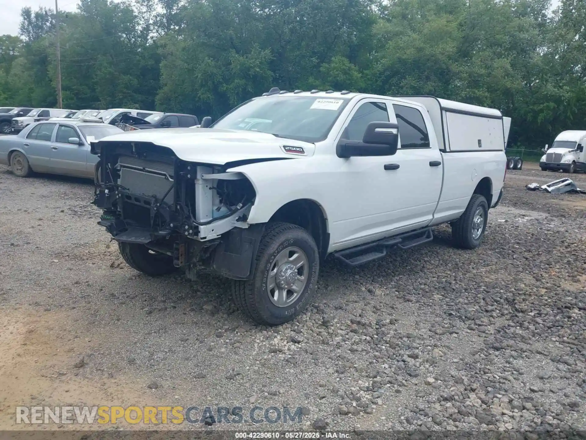 2 Photograph of a damaged car 3C6UR5HJ8RG288173 RAM 2500 2024