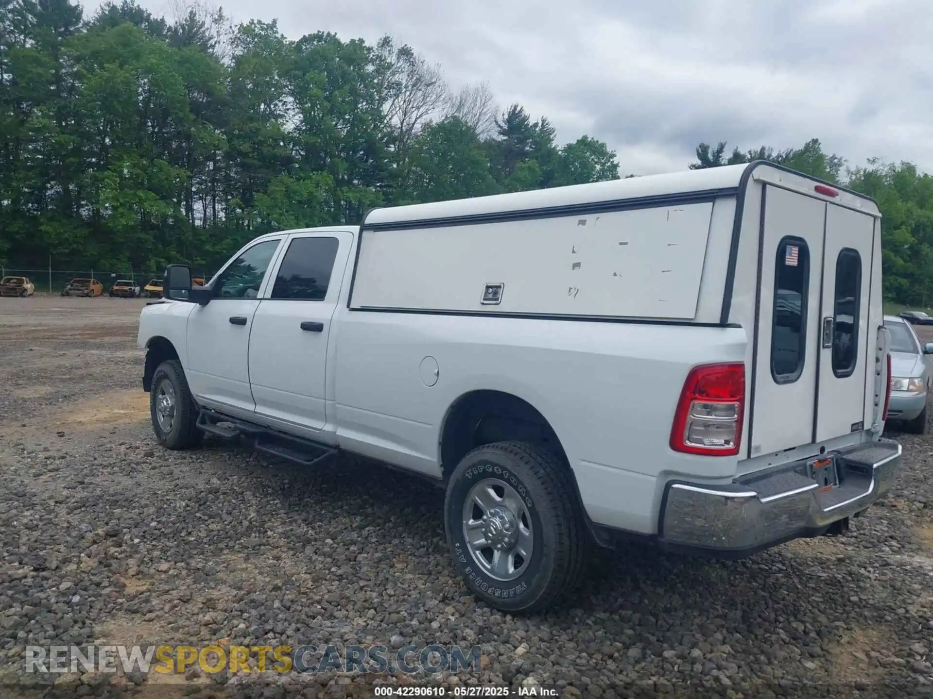 3 Photograph of a damaged car 3C6UR5HJ8RG288173 RAM 2500 2024