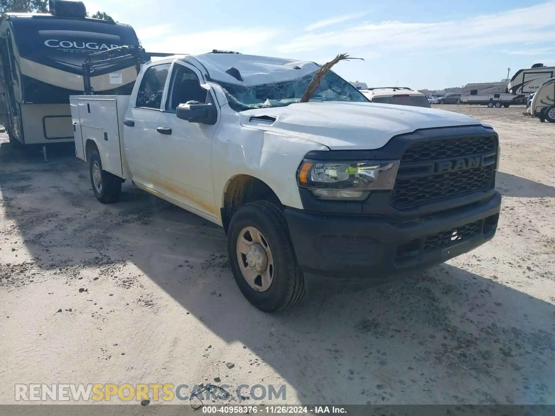 1 Photograph of a damaged car 3C6UR5HJXRG151946 RAM 2500 2024