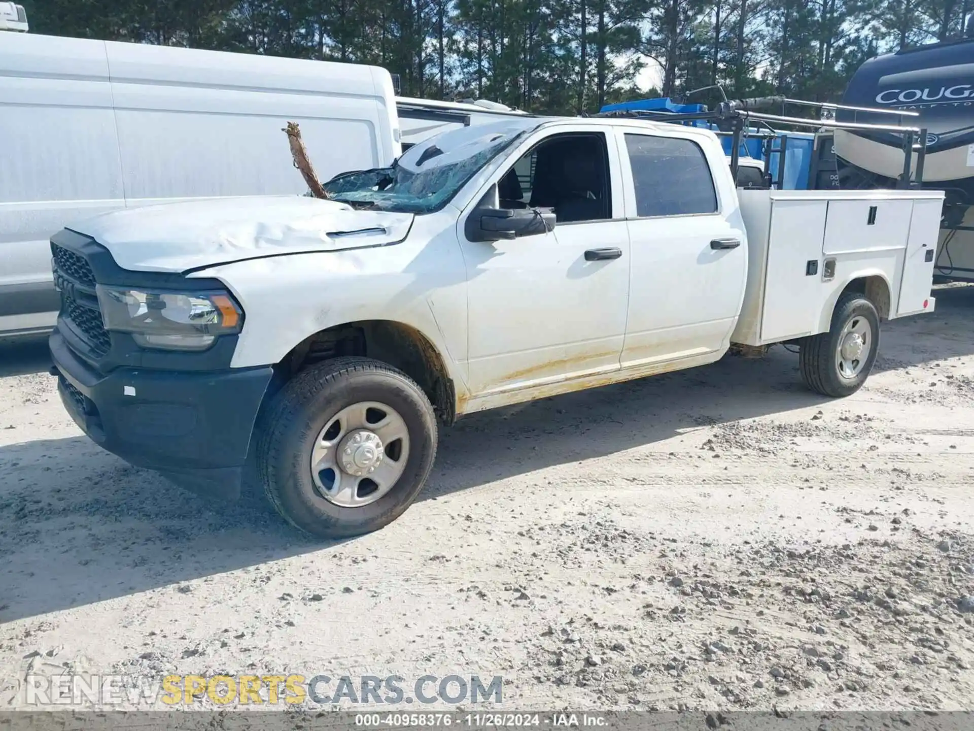 2 Photograph of a damaged car 3C6UR5HJXRG151946 RAM 2500 2024