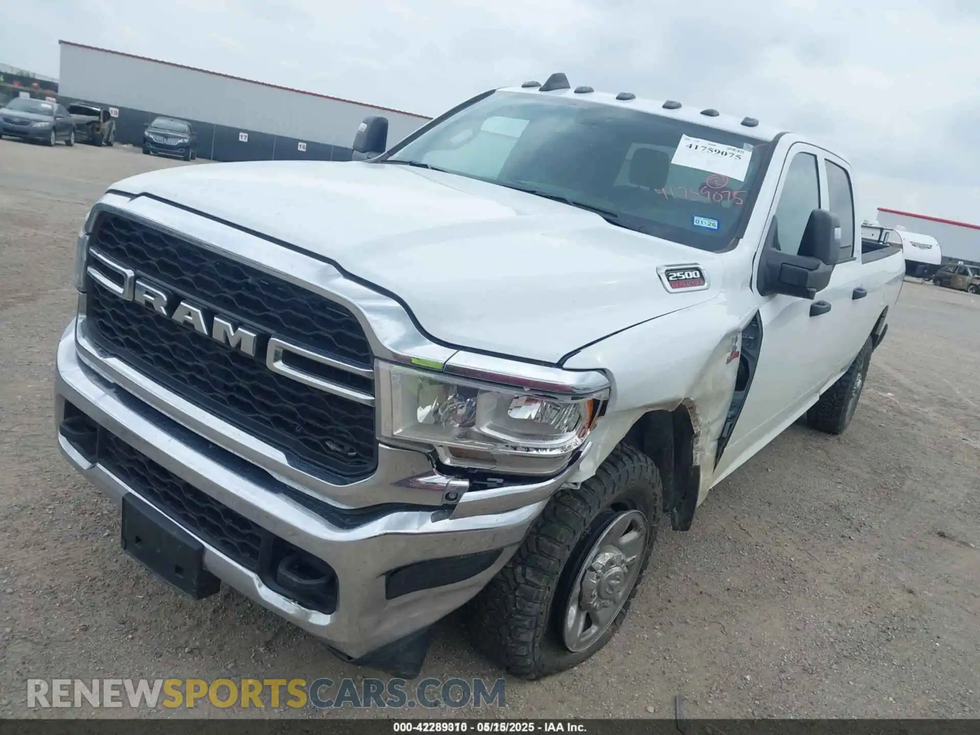 2 Photograph of a damaged car 3C6UR5HL0RG103115 RAM 2500 2024