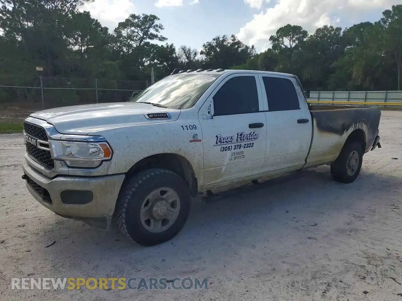 1 Photograph of a damaged car 3C6UR5HL2RG355710 RAM 2500 2024