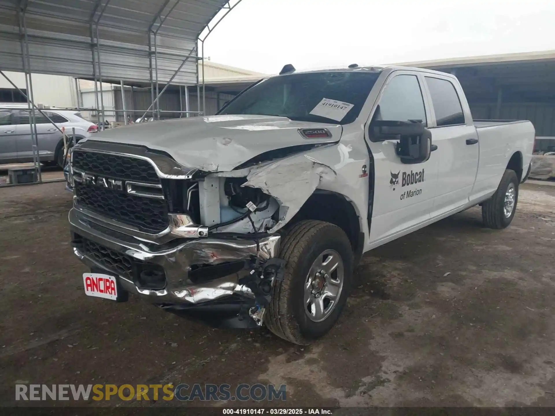 2 Photograph of a damaged car 3C6UR5HL7RG276663 RAM 2500 2024