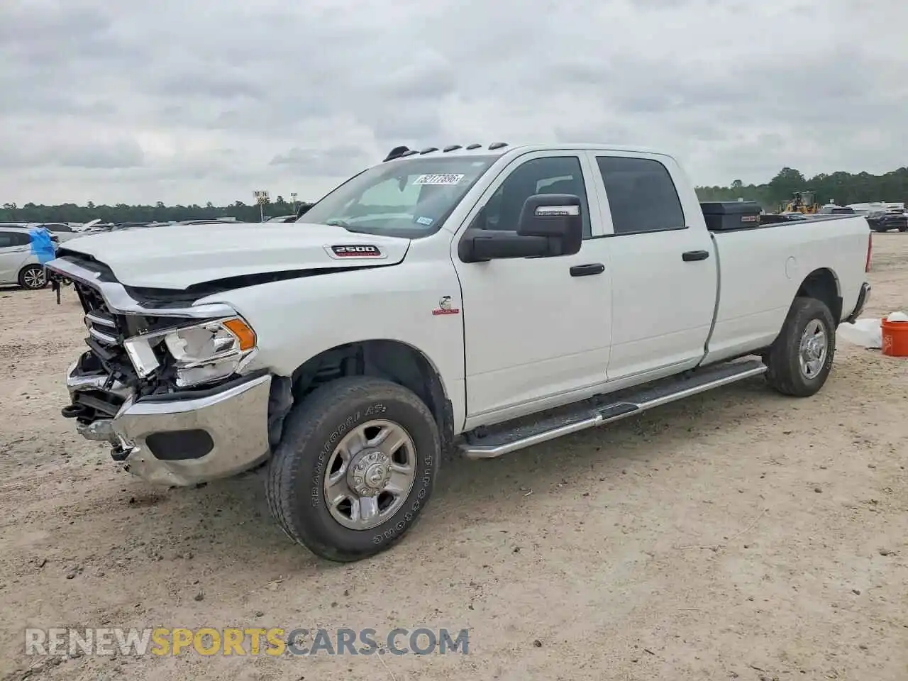 1 Photograph of a damaged car 3C6UR5HL8RG253487 RAM 2500 2024